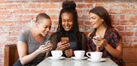 three friends at a coffee shop